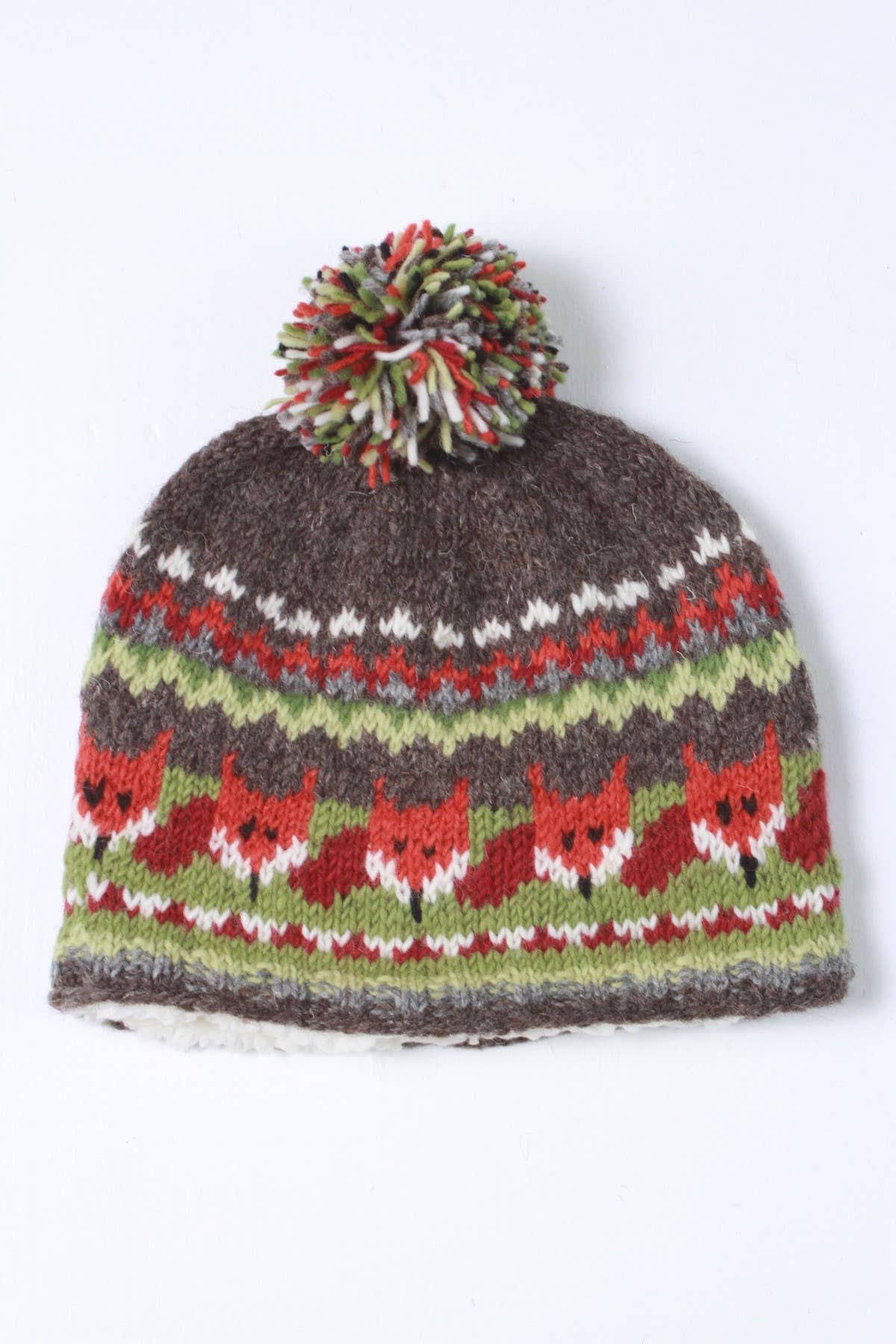 Fair Isle Wollmütze Damen mit Fuchsmuster und mehrfarbigem Bommel