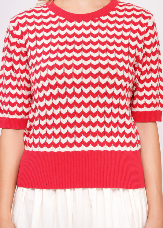 Detail Strickpulli Hibiscus Chevron Muster rot creme Bio Baumwolle