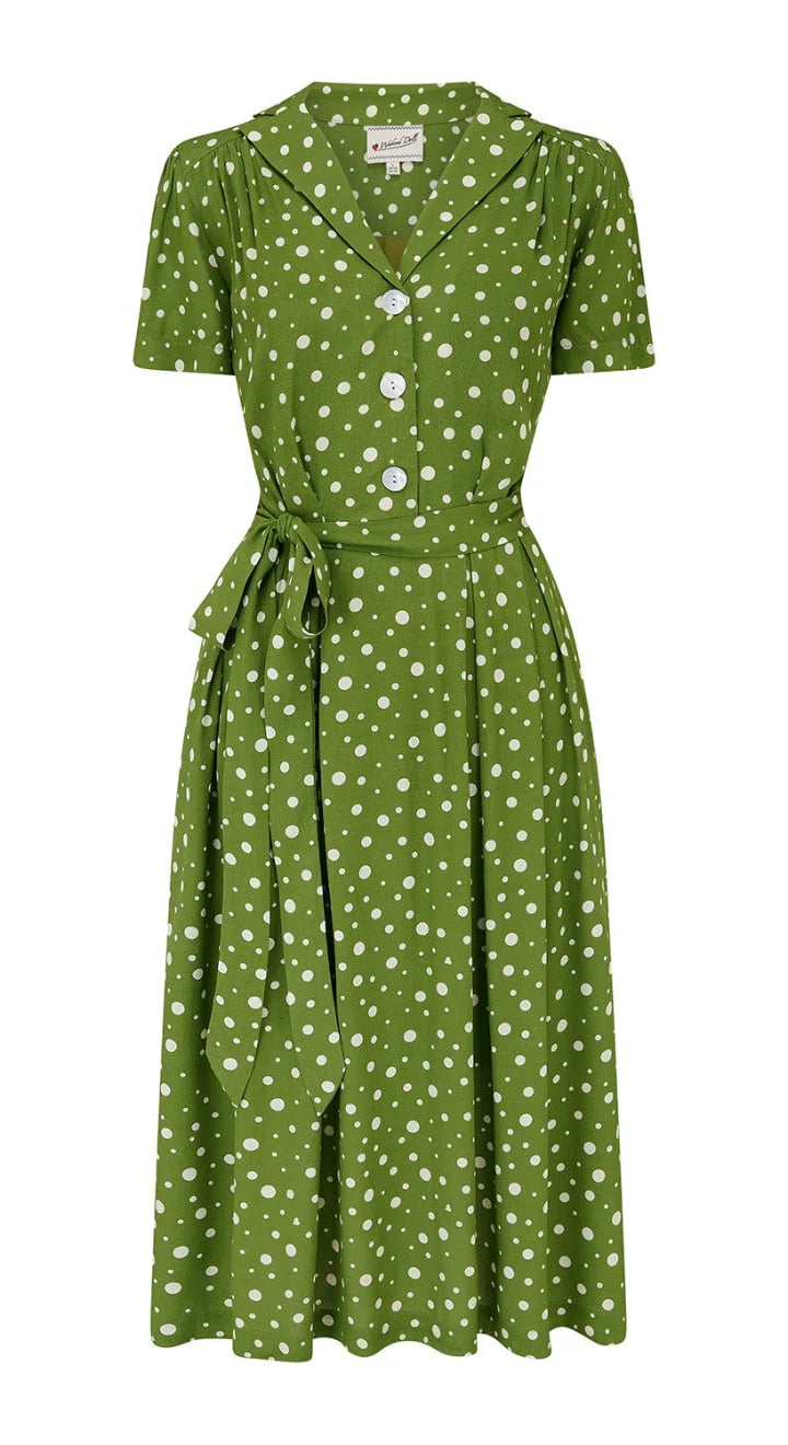 Grünes Retro-Kleid mit Punkten und praktischen Seitentaschen