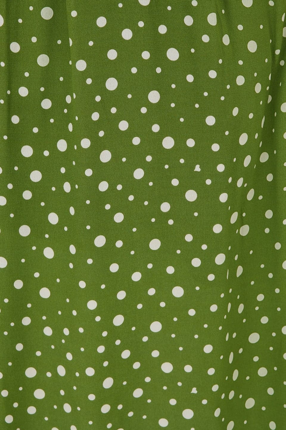 Grüne Damenbluse mit weißen Polka Dots